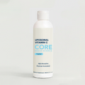 Liposomal Vitamin C liquid supplement bottle with white cap and light-colored formula labeled "CORE" with tropical flavor des