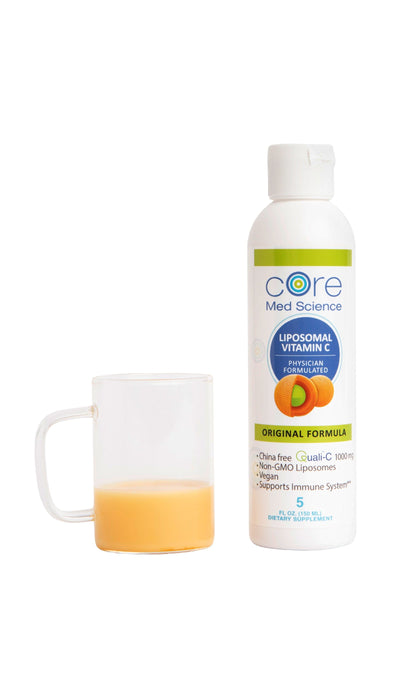 Bottle of Liposomal Vitamin C - Liquid - Orange - With glass